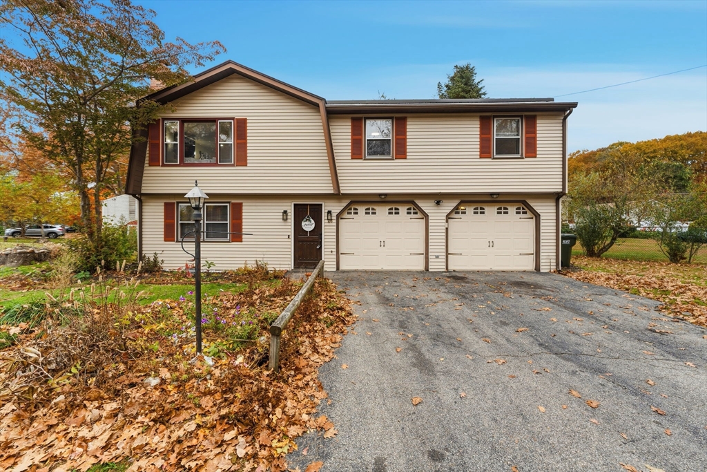 26 Wakefield Avenue Webster, MA 01570 - Photo 4 of 42 a front view of a house with a yard