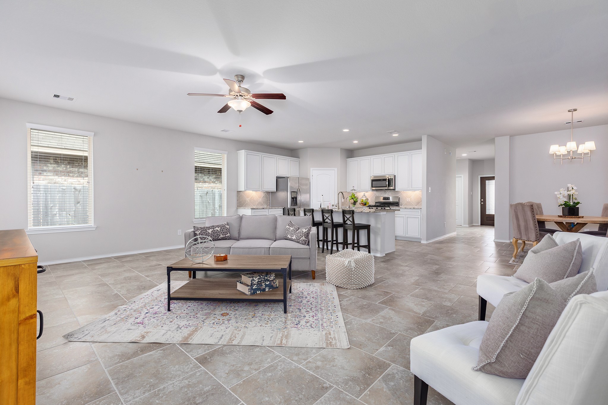 5611 Claymore Meadow Lane Spring, TX 77389 - Photo 11 of 32 a living room with furniture and kitchen view
