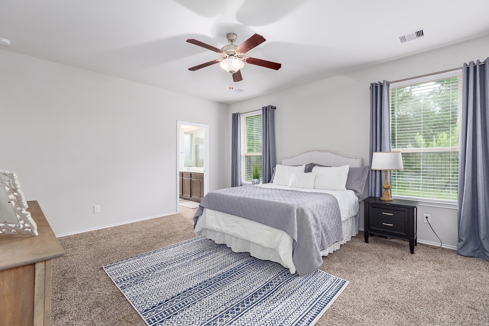 5611 Claymore Meadow Lane Spring, TX 77389 - Photo 15 of 32 a bedroom with a large bed and a window