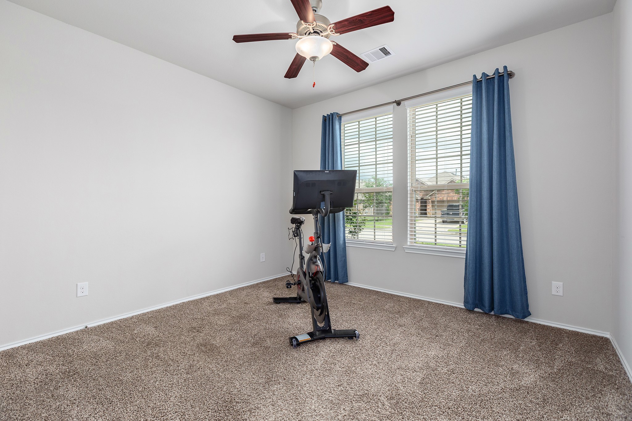 5611 Claymore Meadow Lane Spring, TX 77389 - Photo 21 of 32 a view of a room with gym equipment