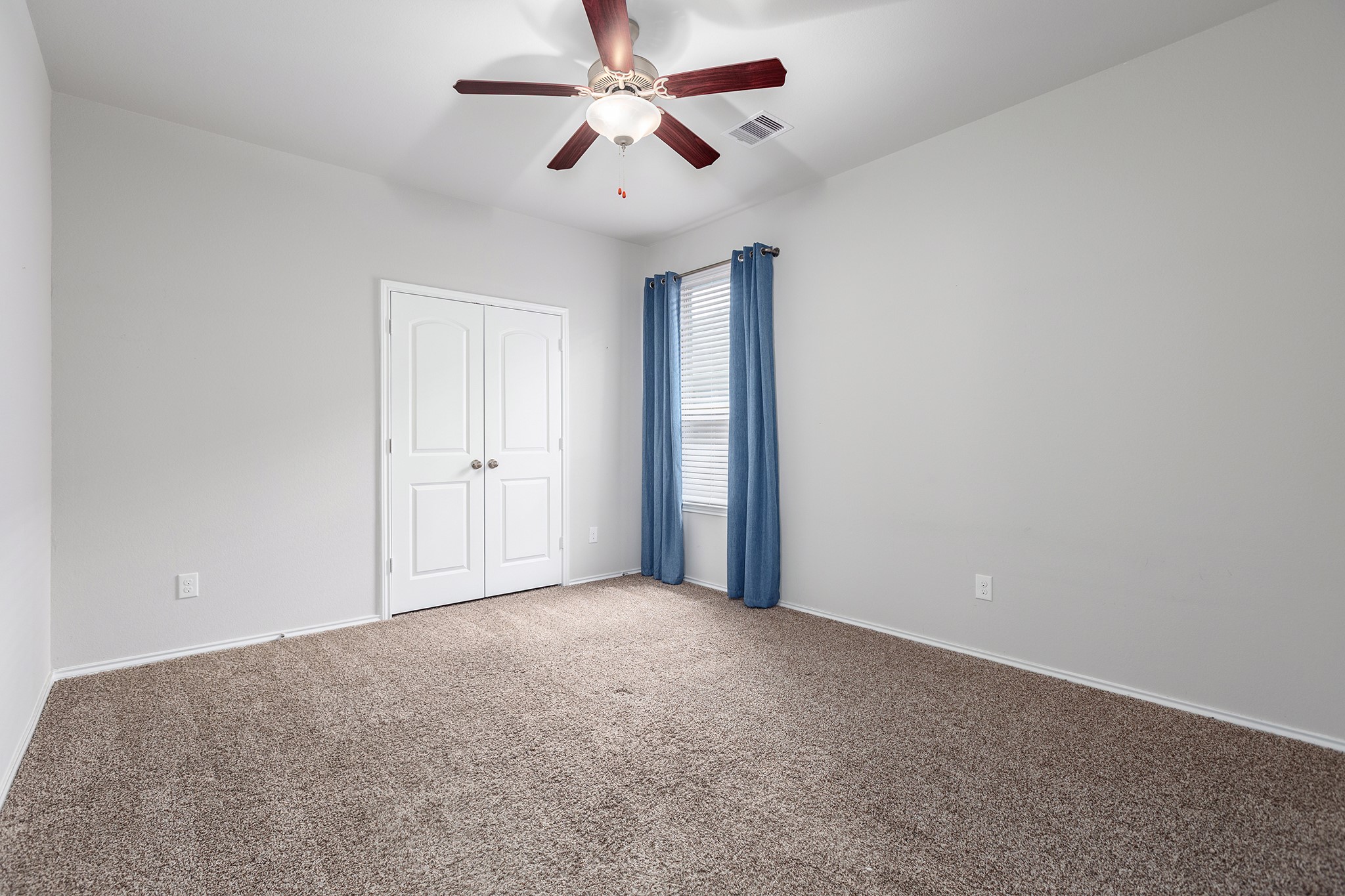 5611 Claymore Meadow Lane Spring, TX 77389 - Photo 23 of 32 a view of an empty room and a ceiling fan