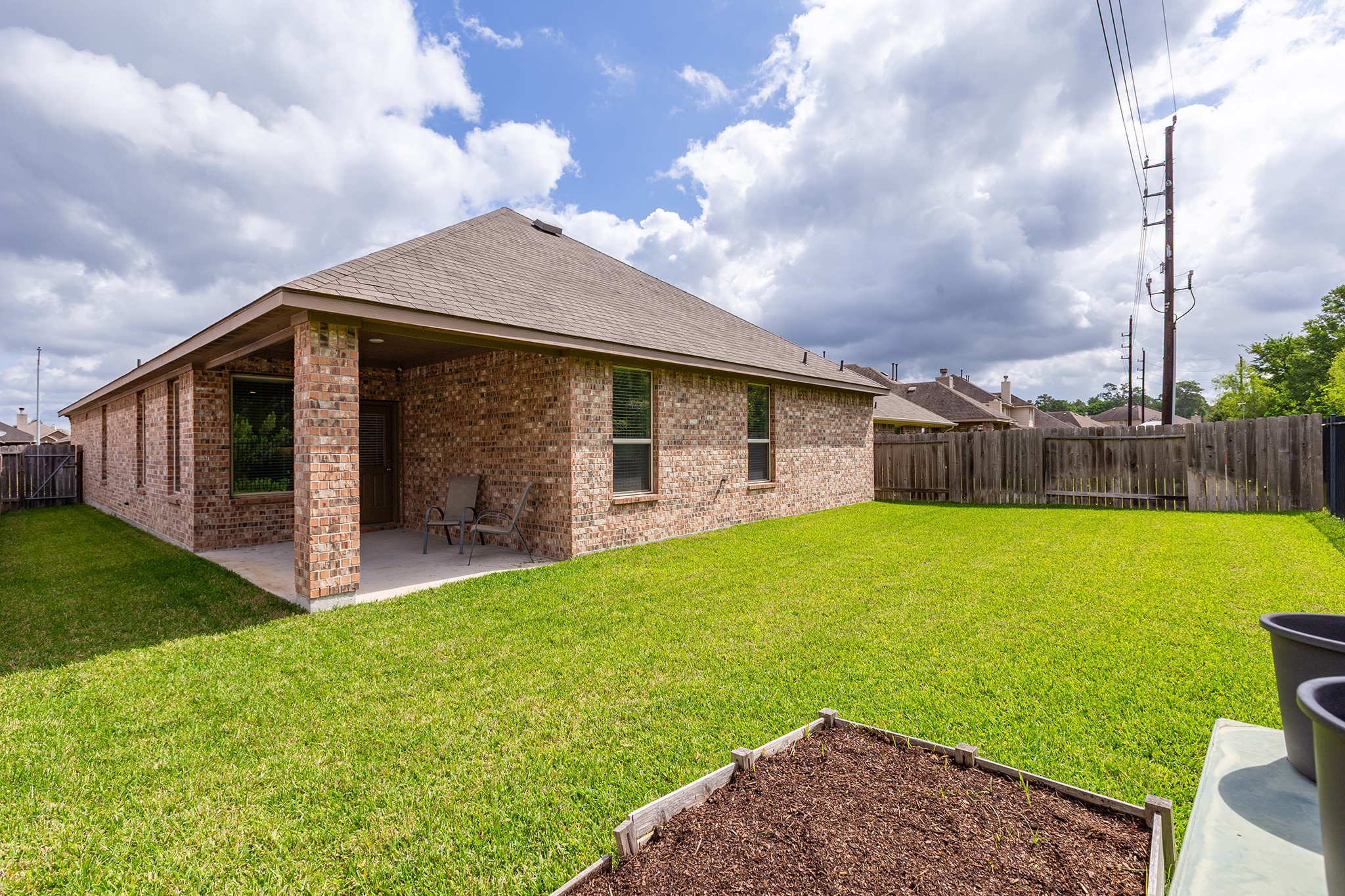 5611 Claymore Meadow Lane Spring, TX 77389 - Photo 27 of 32 a front view of house with yard and green space