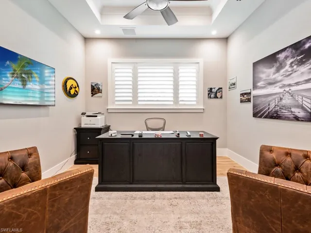 a living room with furniture and window