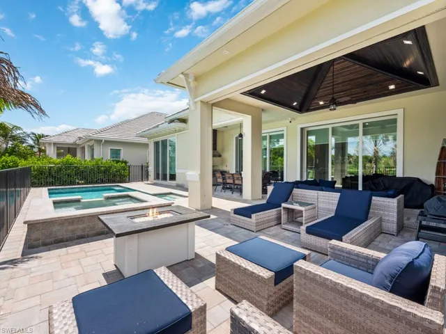 a outdoor living space with patio furniture and garden