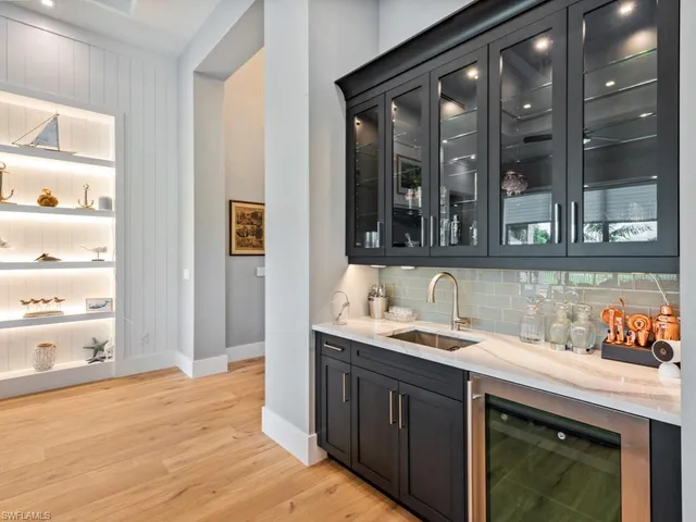 a kitchen with a sink and a window