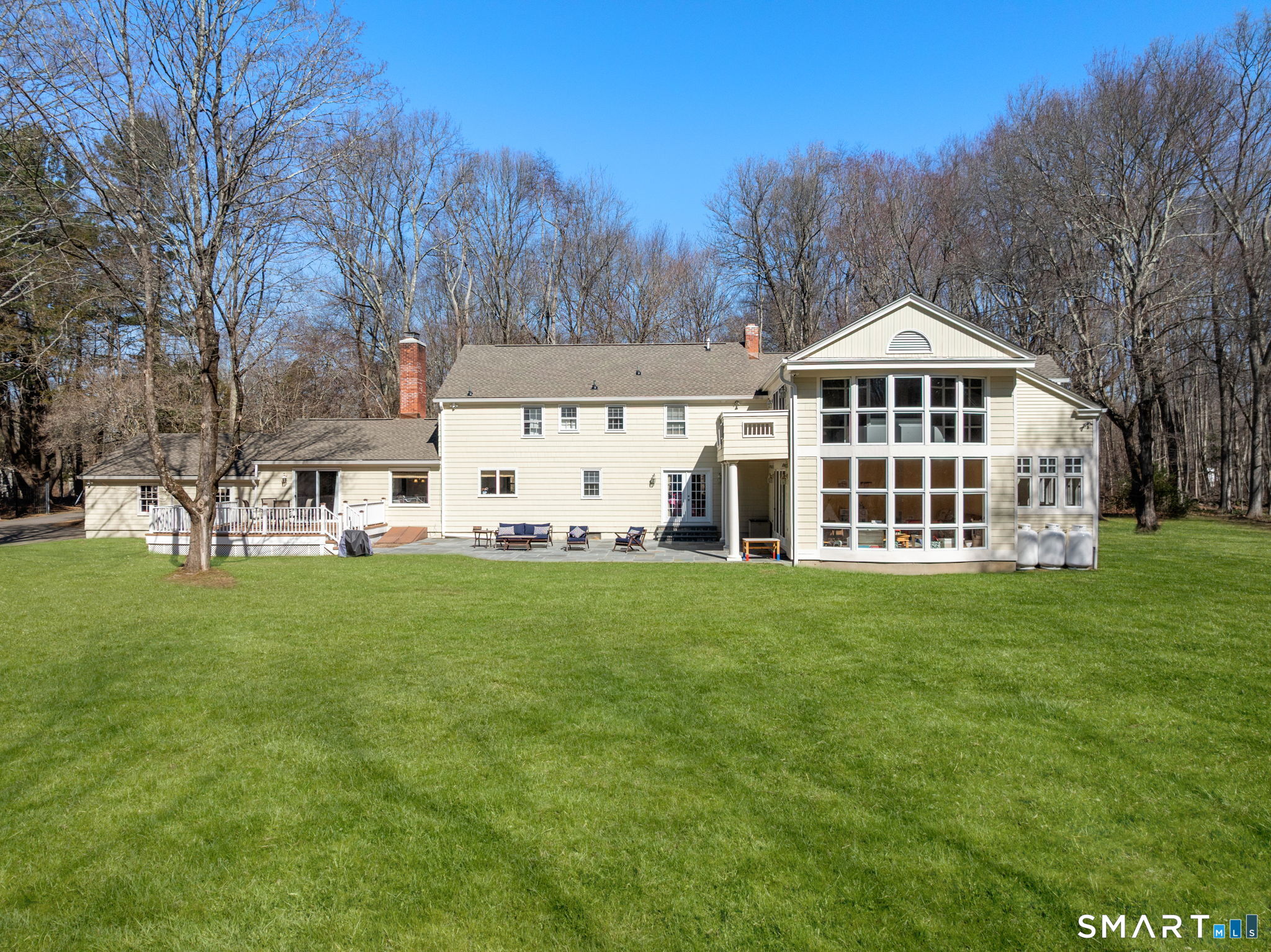 11 Highview Drive Woodbridge, CT 06525 - Photo 29 of 32 Rear exterior showcasing the home's impressive presence.