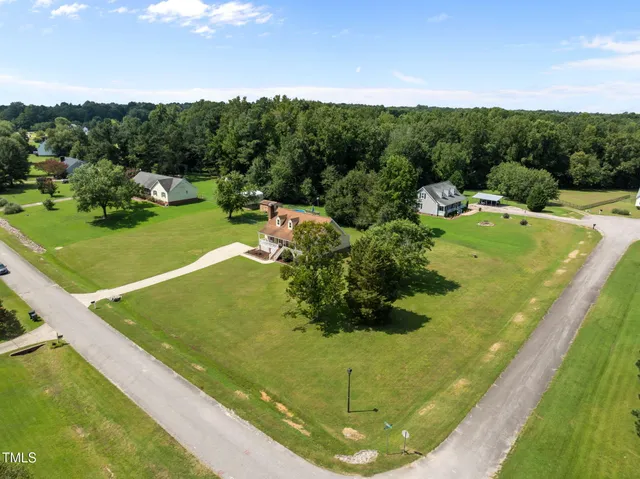 a view of a golf course with a garden