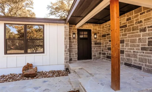 a view of a house with a patio