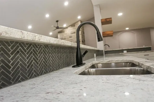 a view of kitchen with cabinets and wooden floor