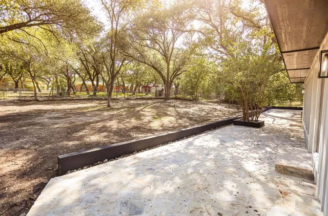 a view of a kitchen with a sink