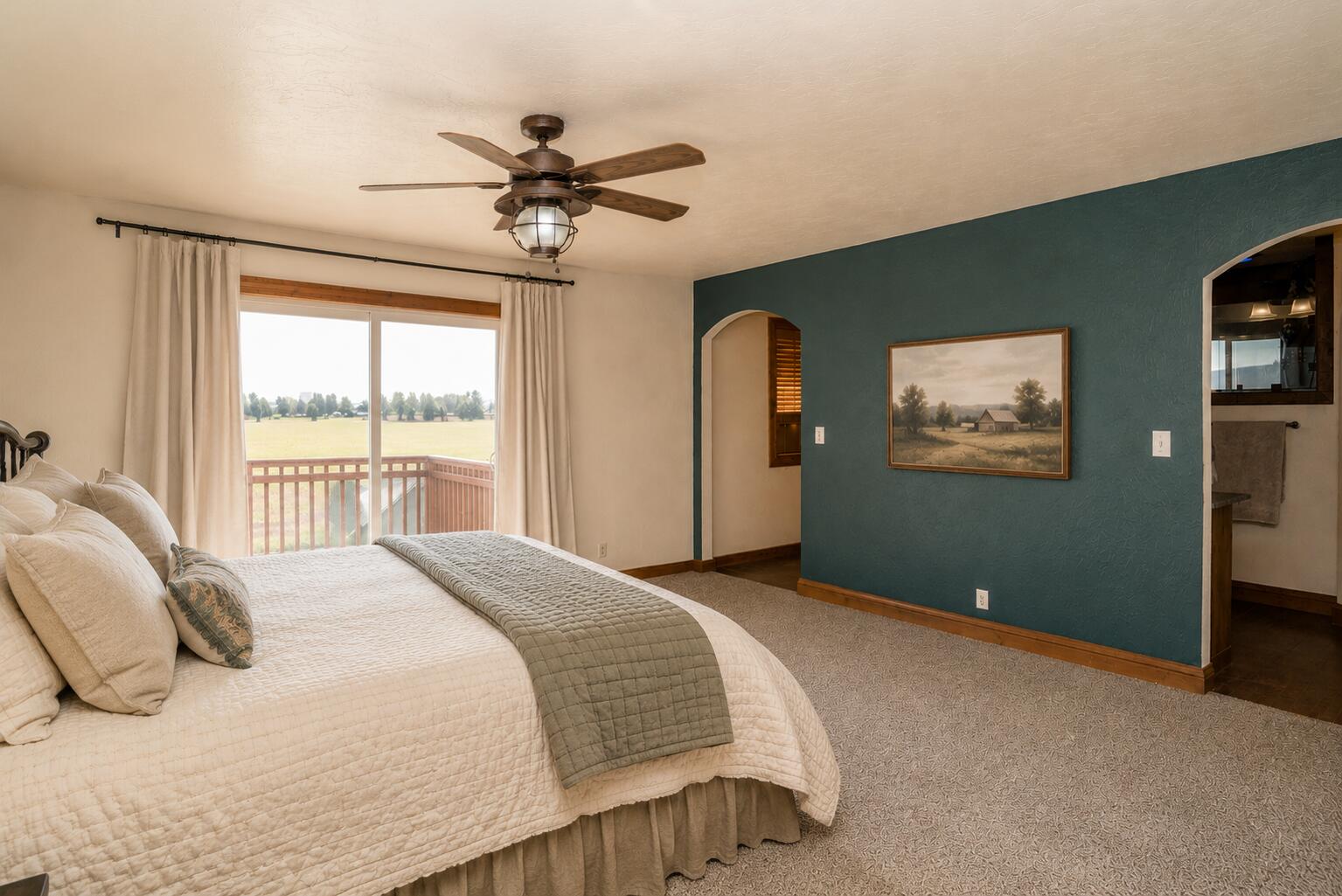 26695 Horsell Road Bend, OR 97701 - Photo 19 of 33 a bedroom with a large bed and a window