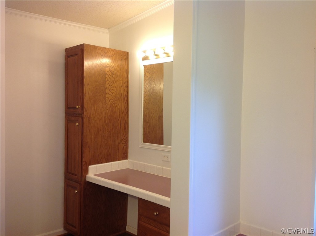 1038 Morning Star Road Appomattox, VA 24522 - Photo 13 of 22 a bathroom with a sink and a mirror