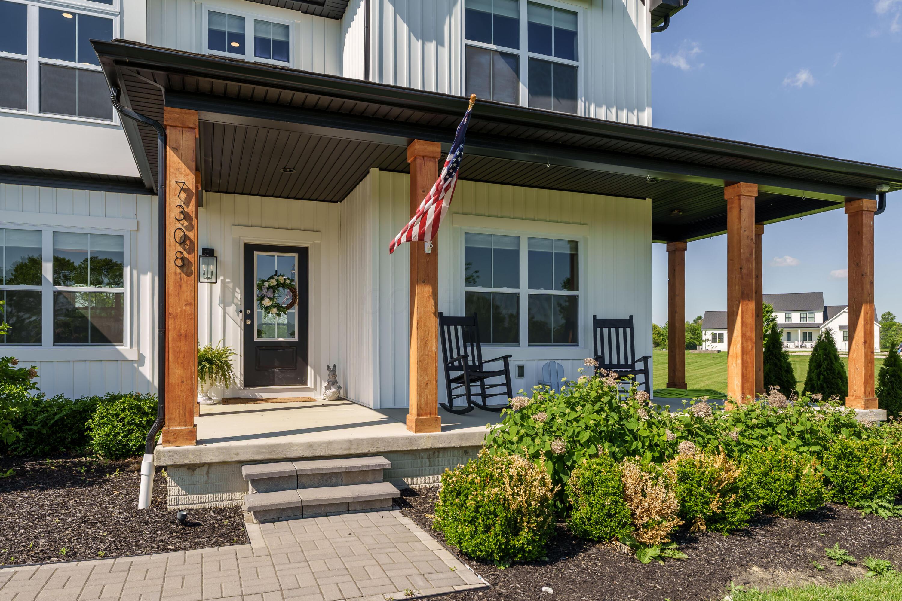 7308 Concord Road Delaware, OH 43015 - Photo 10 of 73 Welcoming Farmhouse-style Porch