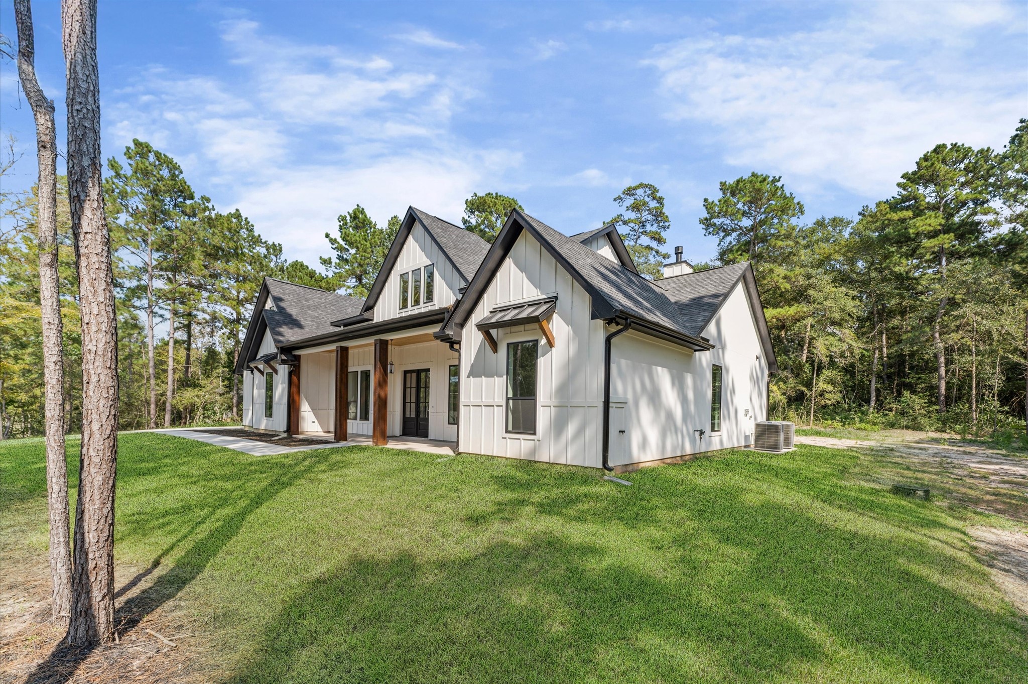 118 Ranger Road Huntsville, TX 77340 - Photo 3 of 49 Welcome home to this stunning custom build in Texas Grand Ranch
