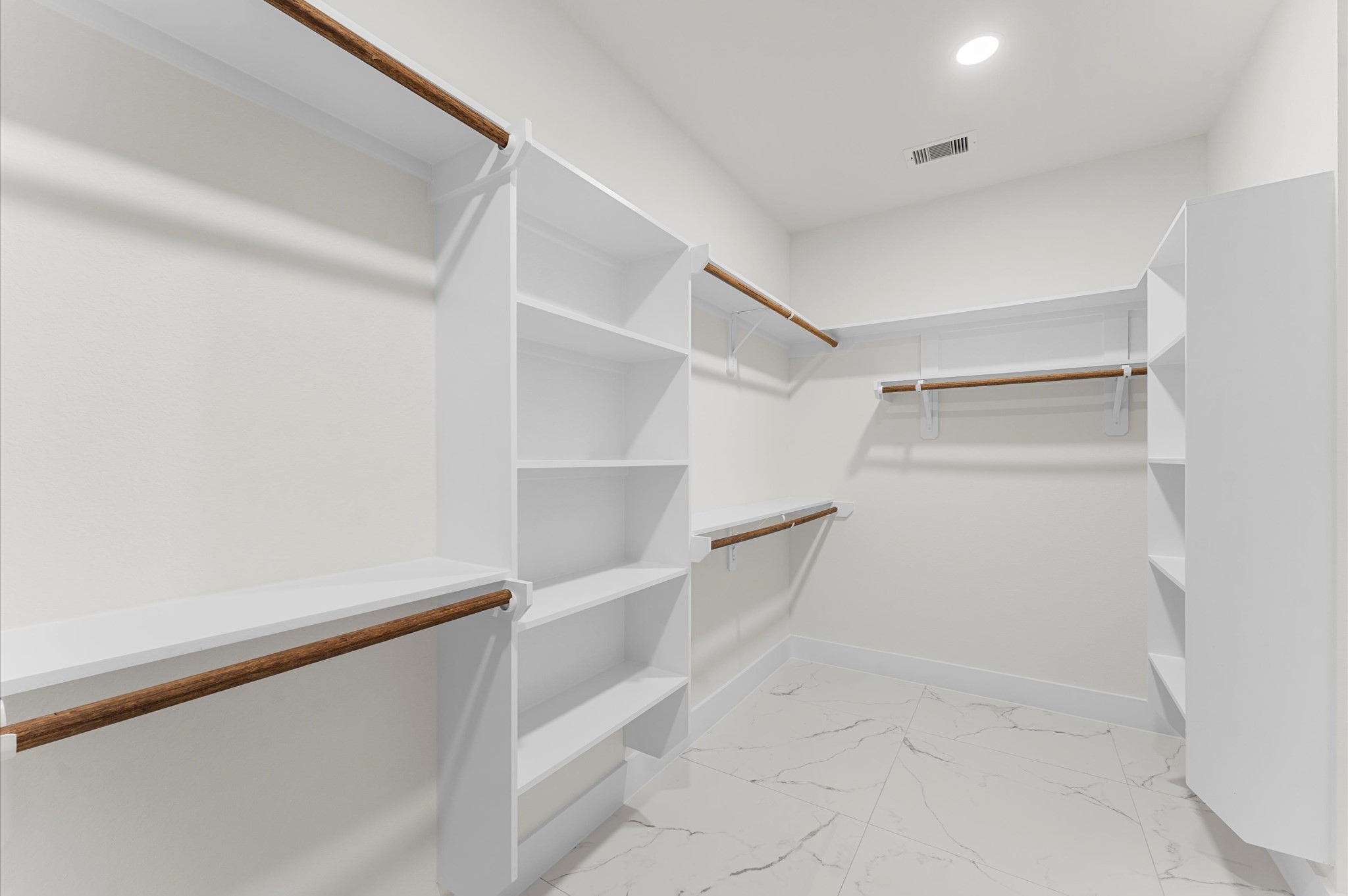 118 Ranger Road Huntsville, TX 77340 - Photo 31 of 49 Primary bedroom walk-in closet