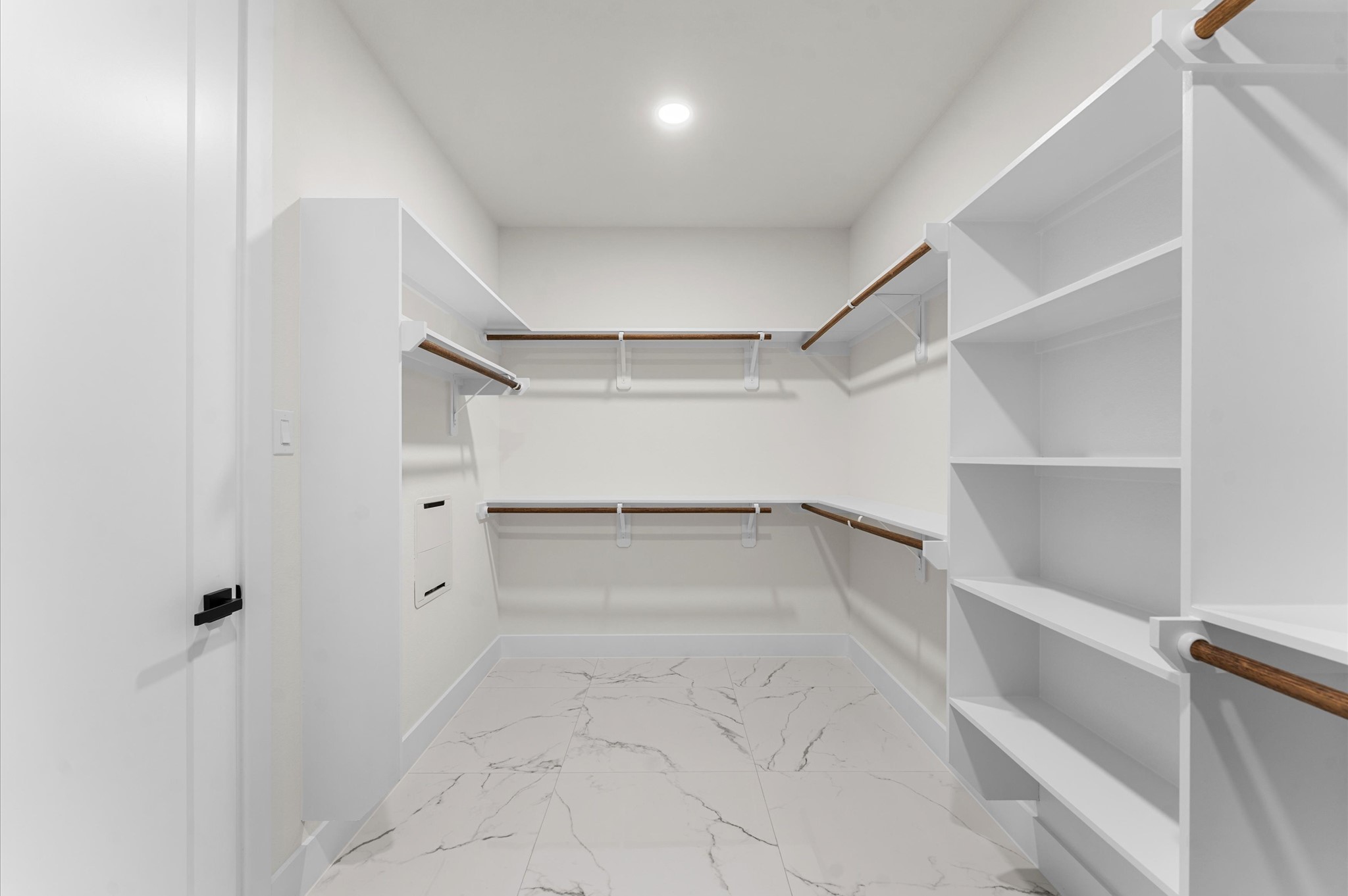 118 Ranger Road Huntsville, TX 77340 - Photo 32 of 49 Primary bedroom walk-in closet