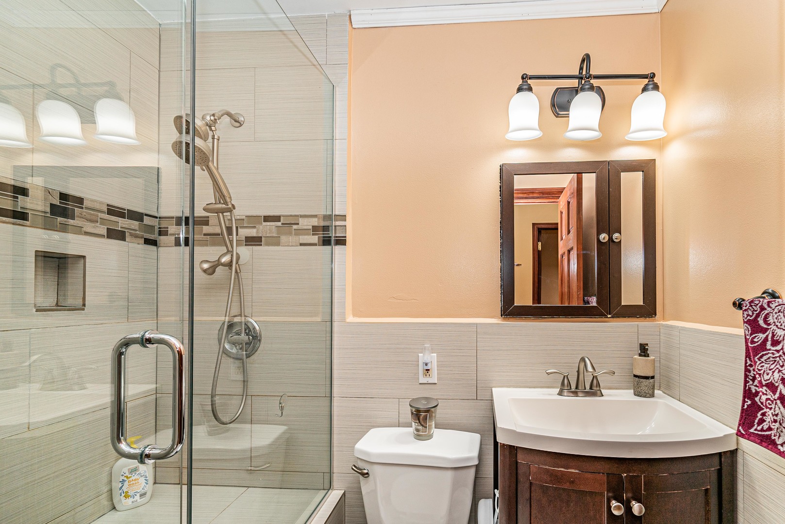 9415 Sumac Road, Unit A Des Plaines, IL 60016 - Photo 5 of 21 a bathroom with a sink a toilet and shower