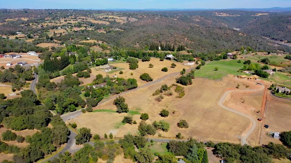 3180 Rattlesnake Road Newcastle, CA 95658 - Photo 37 of 39 an aerial view of white house with yard and mountain view in back