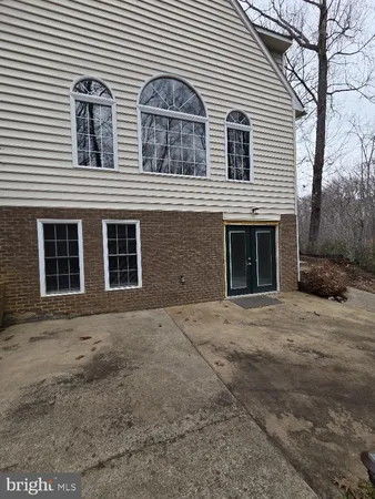 a front view of a house with yard