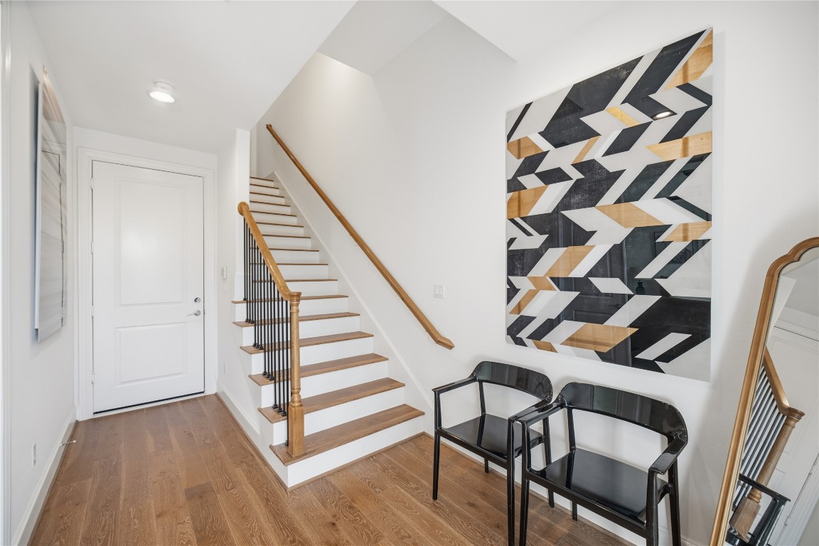 707 Bringhurst Street Houston, TX 77020 - Photo 2 of 23 a view of a room with wooden floor and stairs