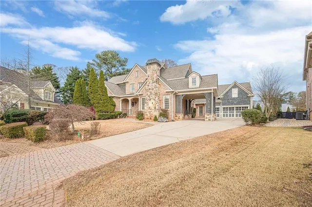 front view of a house with a view of a building