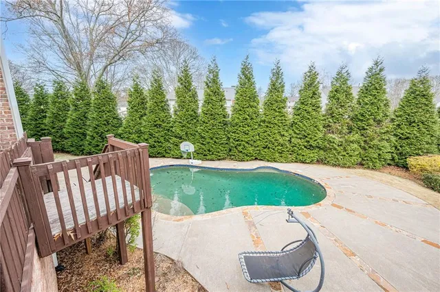 a kitchen with stainless steel appliances granite countertop a stove and cabinets