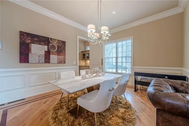 a spacious bedroom with a bed and a couch