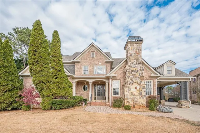 front view of a house with a yard