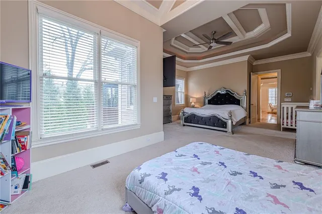 a view of a livingroom with natural light