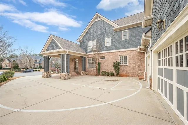 a living room with furniture a fireplace and a table