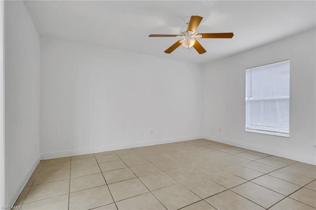 190 15th Street Southwest Naples, FL 34117 - Photo 12 of 26 an empty room with windows