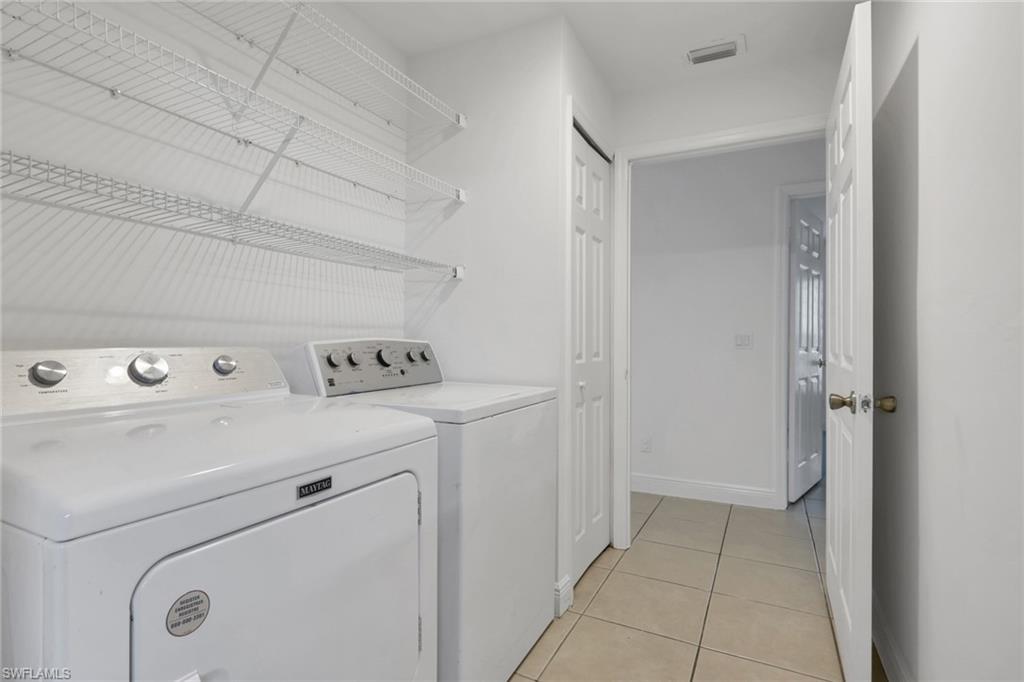 190 15th Street Southwest Naples, FL 34117 - Photo 18 of 26 a utility room with dryer and washer