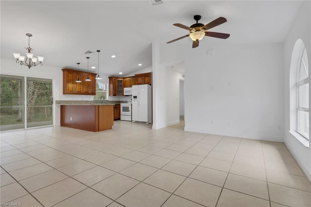 190 15th Street Southwest Naples, FL 34117 - Photo 9 of 26 a view of kitchen and window