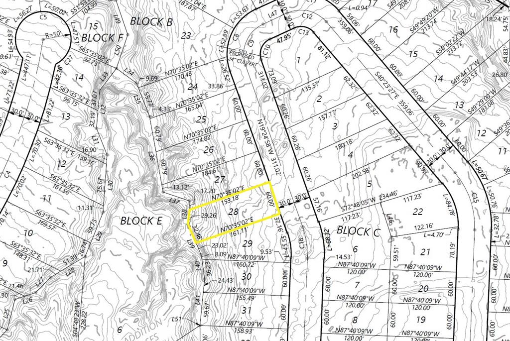 28 Windrose Loop Gordonville, TX 76245 - Photo 7 of 35 a bathroom with a sink and a shower curtain