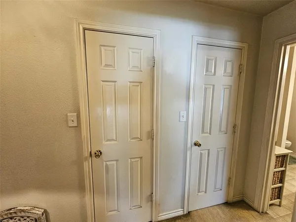 a view of a bathroom with a glass door