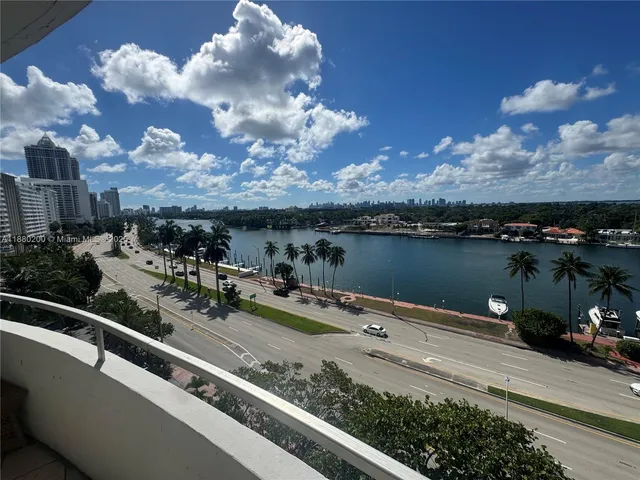 a view of a lake in middle of a city