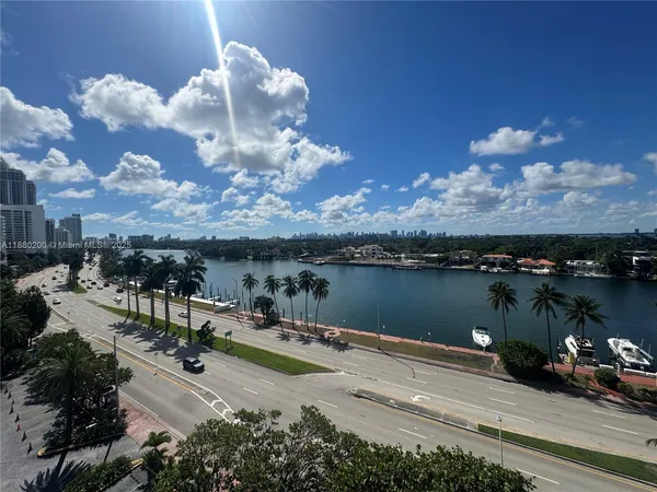 a view of balcony with furniture