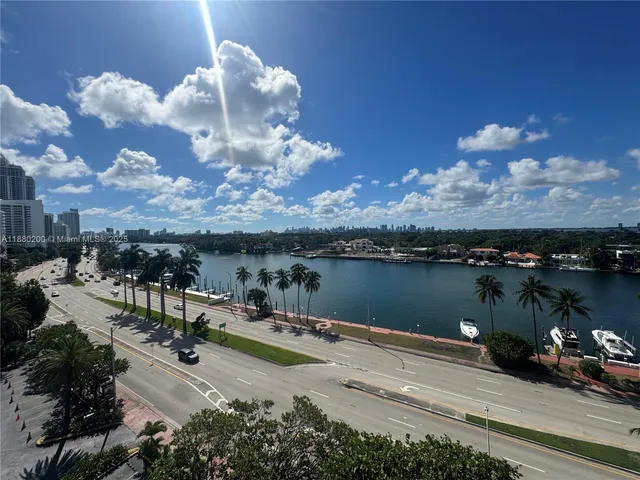 a view of balcony with furniture