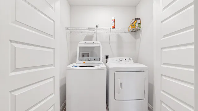 a utility room with dryer and washer