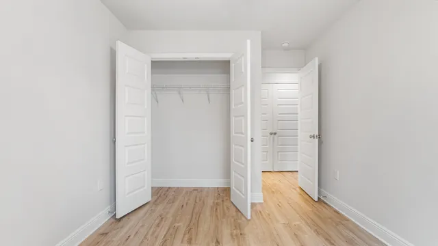 a view of bathroom with wooden floor