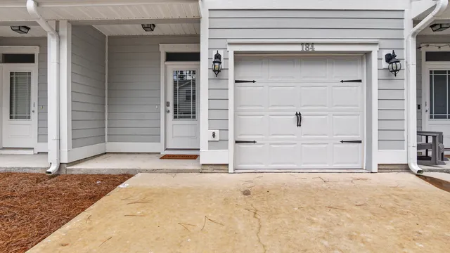 a view of a house with white door
