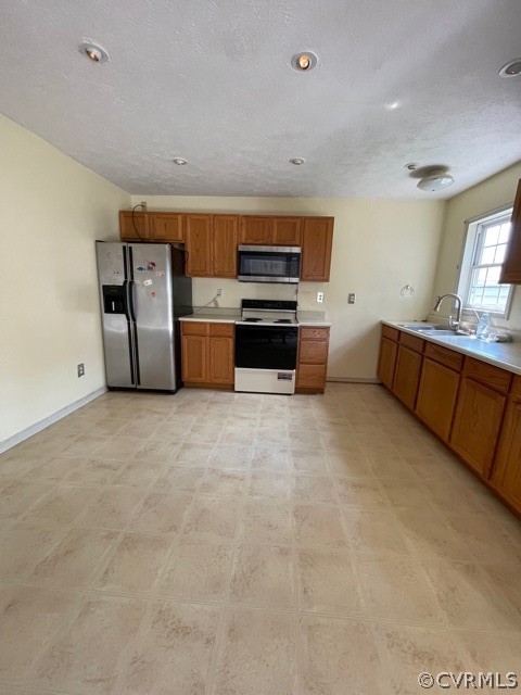 3232 Nahant Road Midlothian, VA 23112 - Photo 13 of 31 a living room with stainless steel appliances furniture a flat screen tv and kitchen view