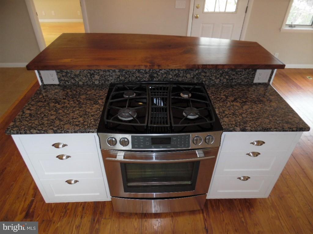 610 Wilderness Road Linden, VA 22642 - Photo 10 of 68 Kitchen Island -gas cooking- walnut breakfast bar