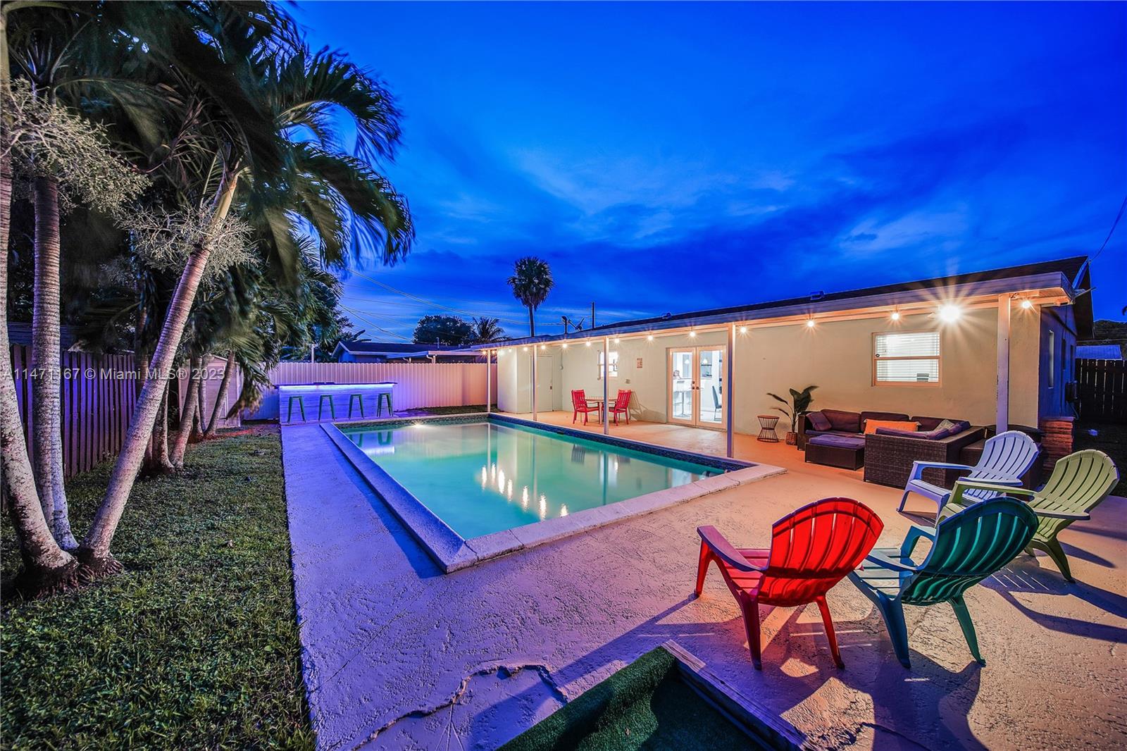 6750 Hope Street Hollywood, FL 33024 - Photo 1 of 54 a view of a chairs and table in patio
