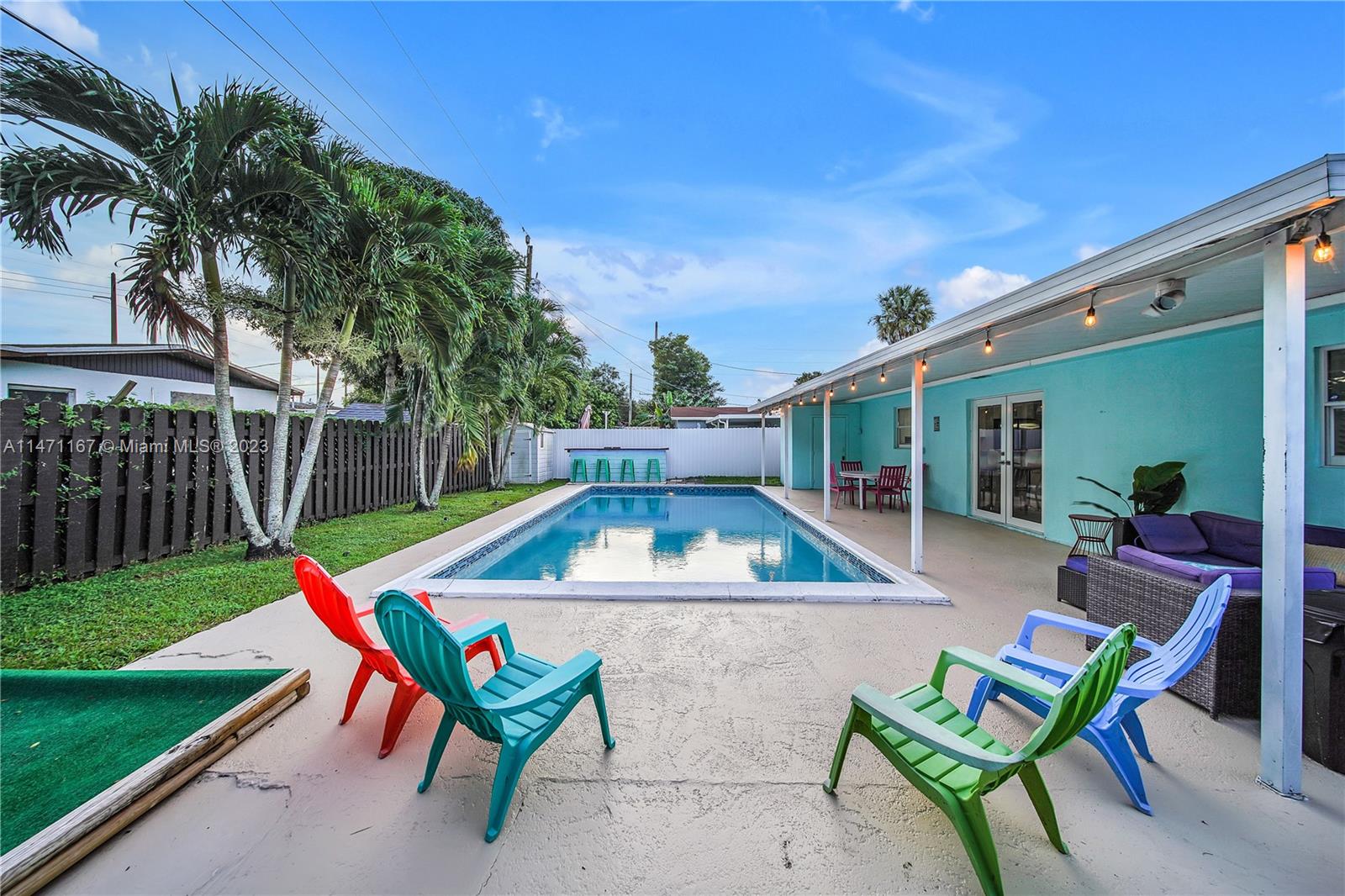 6750 Hope Street Hollywood, FL 33024 - Photo 12 of 54 a view of swimming pool with a lounge chairs