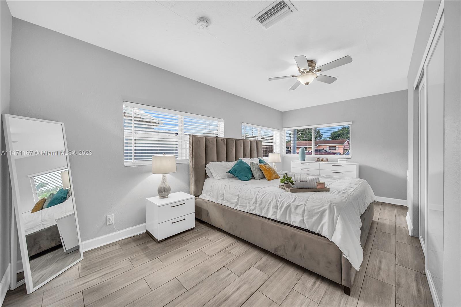 6750 Hope Street Hollywood, FL 33024 - Photo 41 of 54 a bedroom with a bed and a window