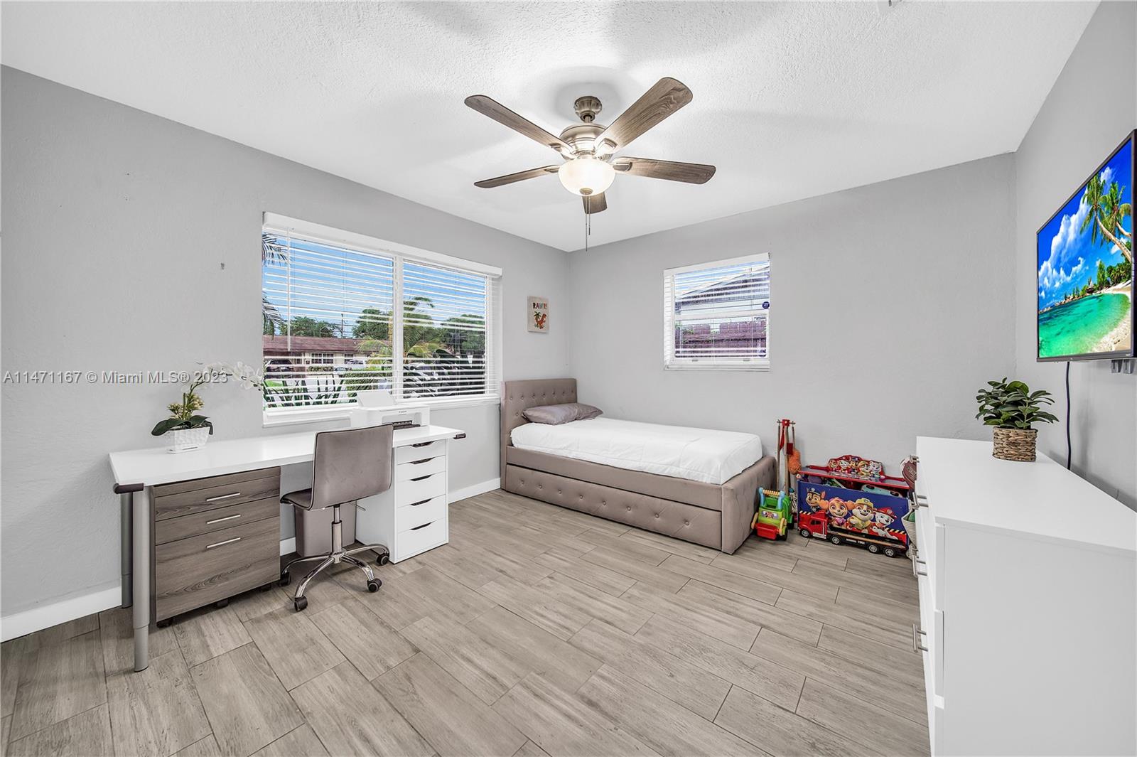 6750 Hope Street Hollywood, FL 33024 - Photo 44 of 54 a workspace with wooden floor and a window