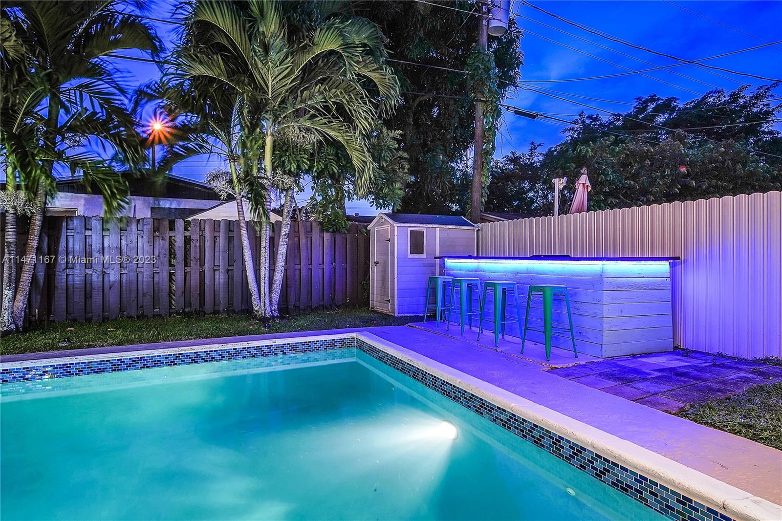 6750 Hope Street Hollywood, FL 33024 - Photo 51 of 54 a view of a backyard with wooden fence
