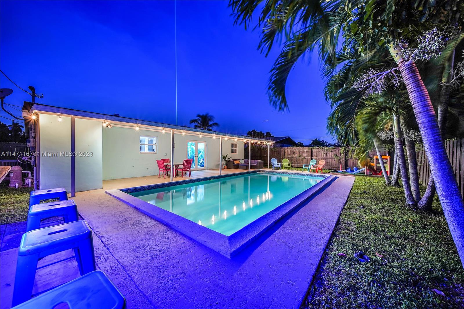 6750 Hope Street Hollywood, FL 33024 - Photo 53 of 54 a view of an outdoor space with a swimming pool