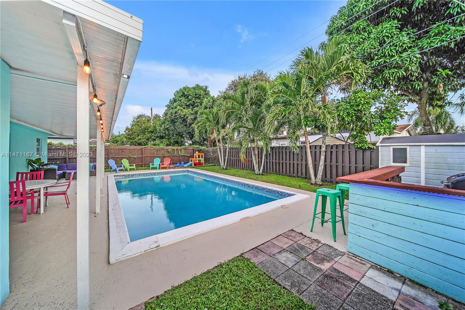 6750 Hope Street Hollywood, FL 33024 - Photo 6 of 54 a view of a chairs and table on the wooden floor